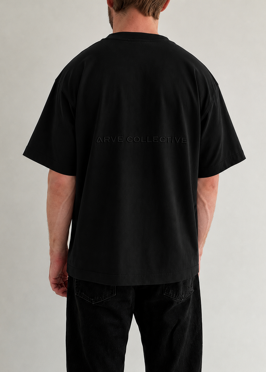 Relaxed fit unisex black t-shirt with 3D embroidery in structured cotton by Arve Collective
