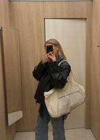 Large everyday canvas bag with minimalistic, structured design by Arve Collective